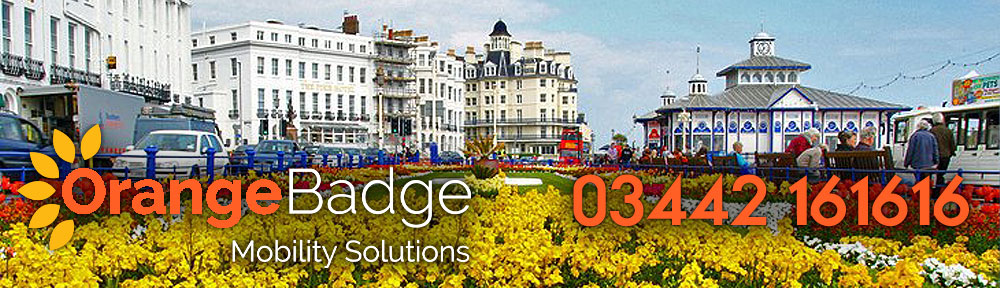 eastbourne seafront with flowers and orange badge mobility logo & 03442 161616 phone number for the mobility bathrooms in Eastbourne page