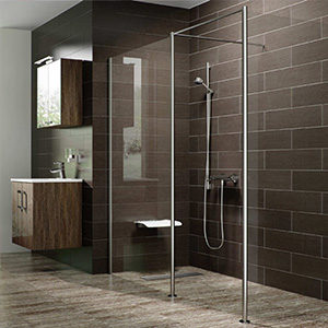 a beautiful level access shower finished in gloss brown tile with glass screens