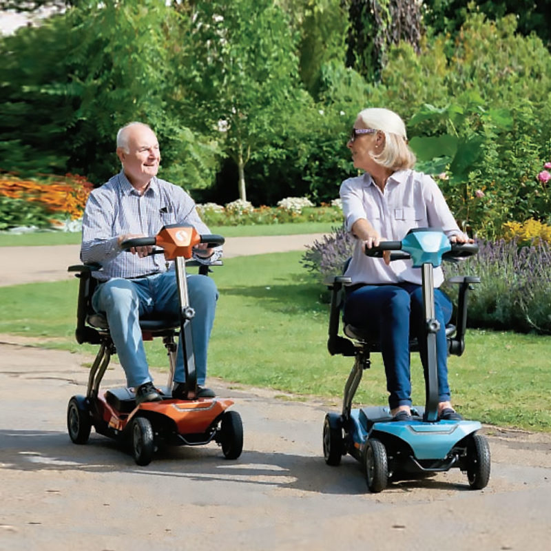 Couple in Mobility Scooters
